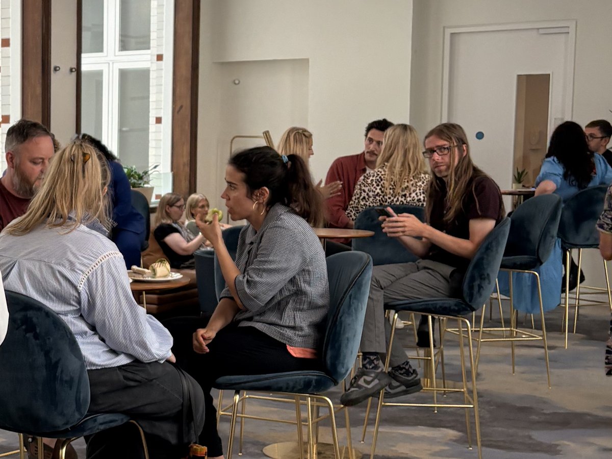 Delegates talking over coffee at the previous stylus seminar